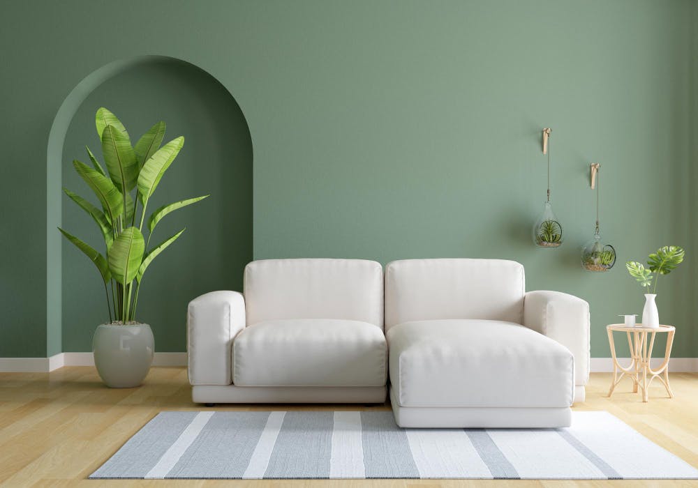 sofa in green living room with copy space