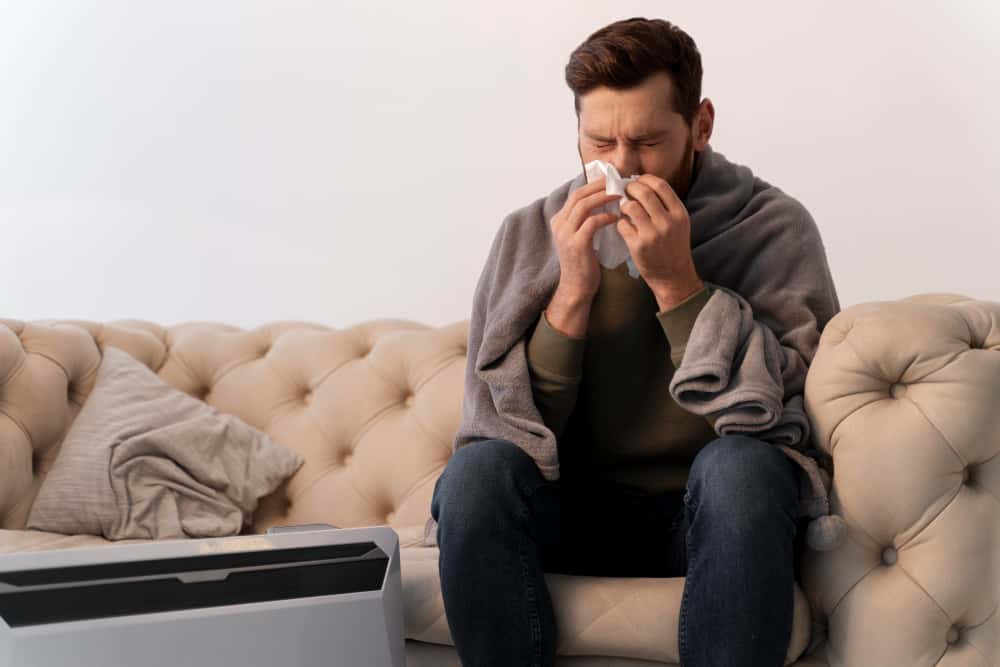 close up on young adult sick at home