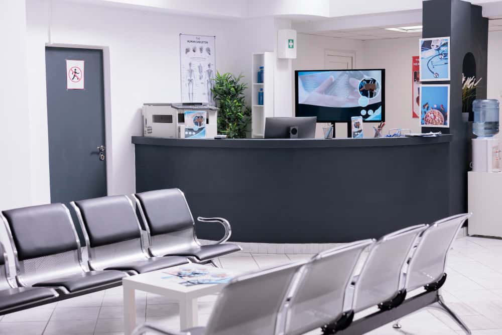 clinical-reception-with-waiting-room-facility-lobby-registration-counter-used-patients-with-medical-appointments-empty-reception-desk-health-center-checkup-visits