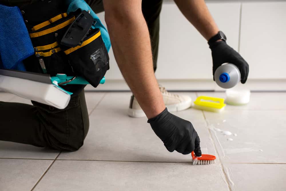 man doing professional home cleaning service
