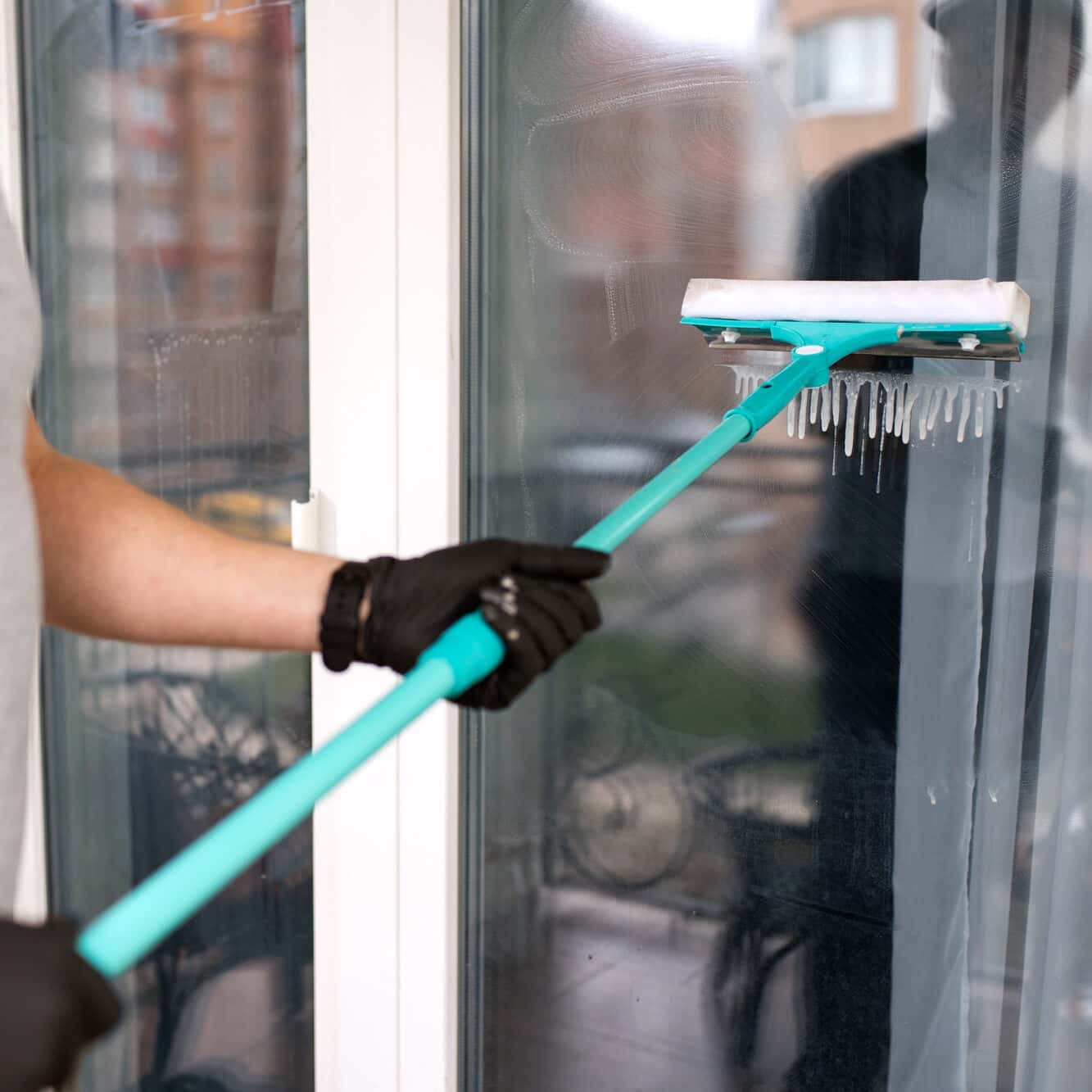 man doing professional home cleaning service