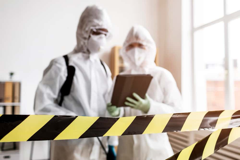 people-protective-suits-talking